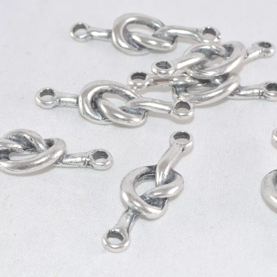 Intercalaire en forme de noeud