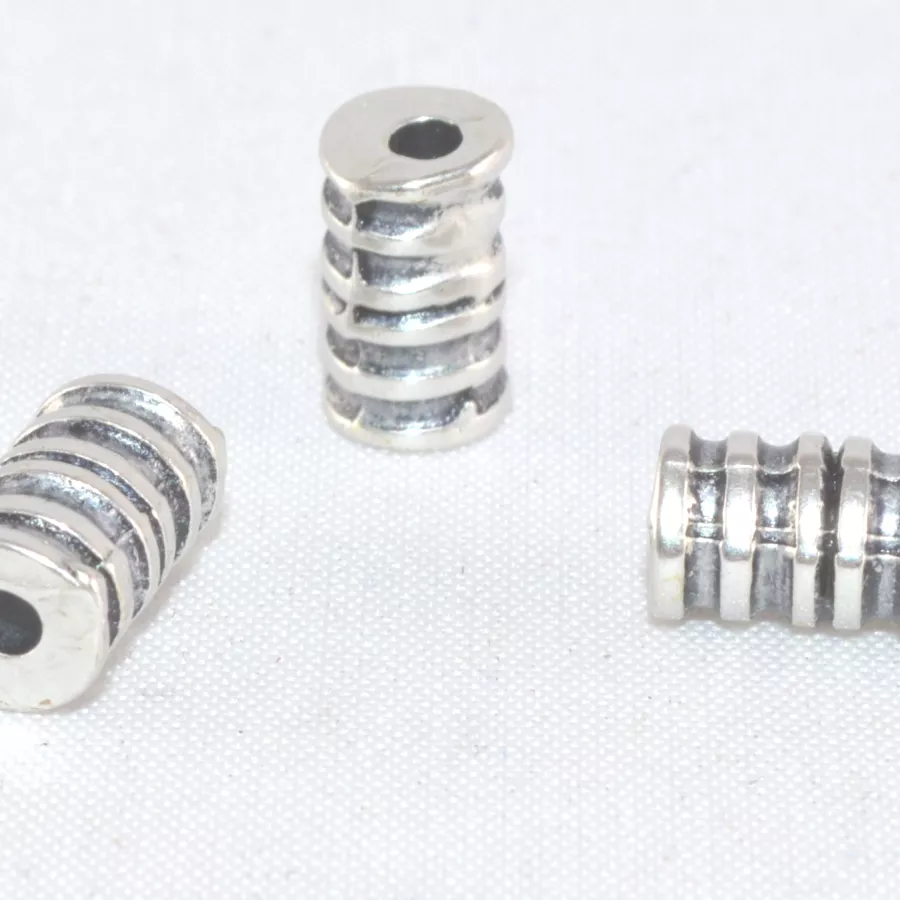 Intercalaire en forme cylindrique