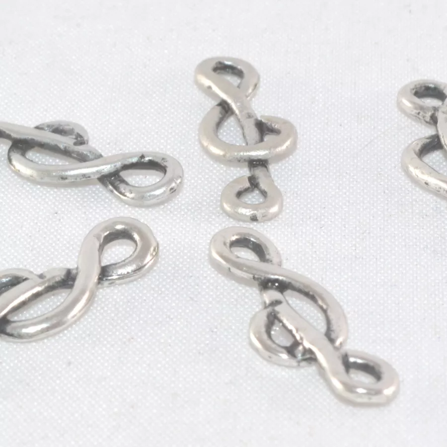 Intercalaire en forme de clé de sol