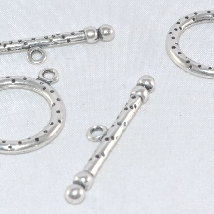 Fermoir T avec des points