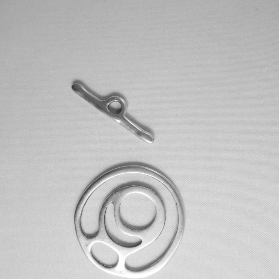 Fermoir T avec motif