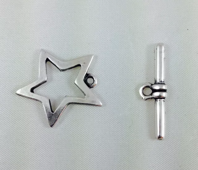 10 Fermoirs  t en forme d'etoile