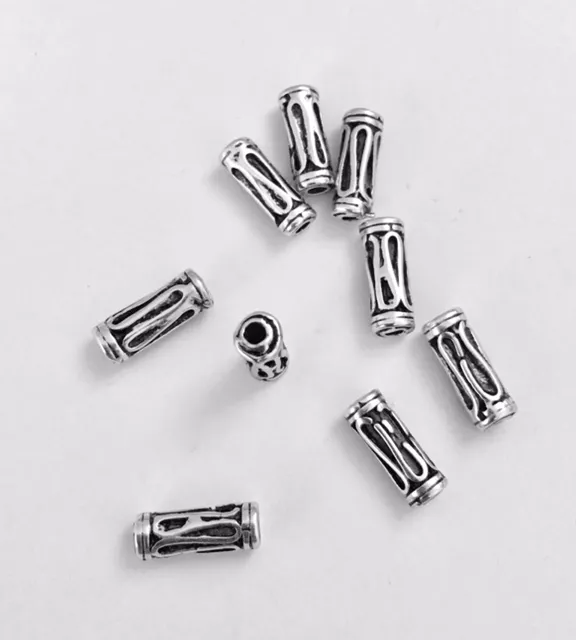 Intercalaire cylindrique  traversant 