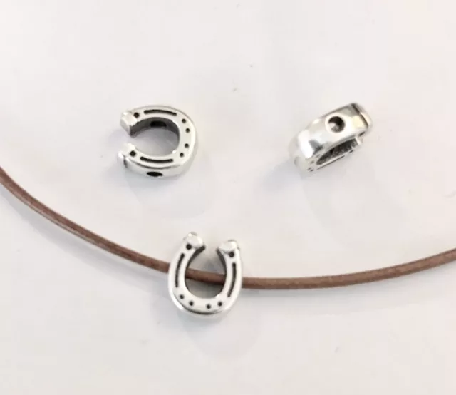 Fer à cheval traversant