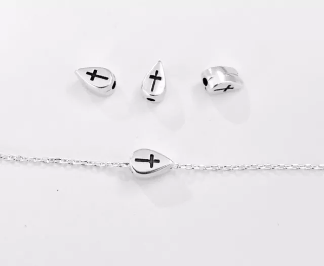 Intercalaire traversant forme poire motif croix