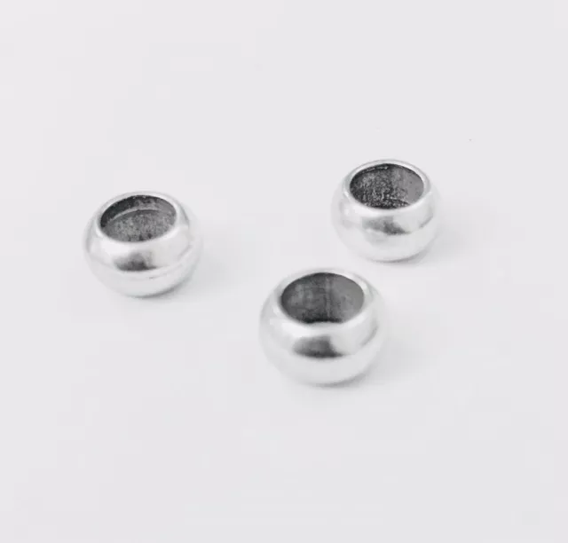 Perles en metal 8.70mm diam trou : 5mm
