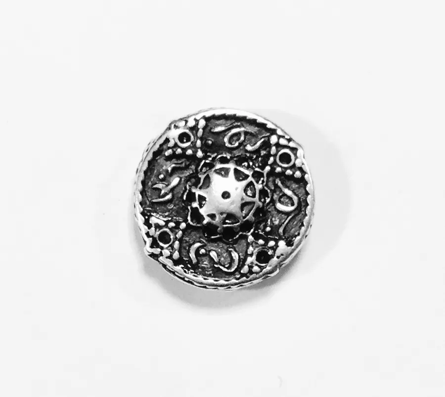 Intercalaire pastille traversant 2 trous motifs arabesques