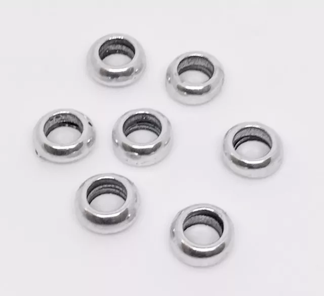 perles de 7.09 de diam ; trou : 4.30mm