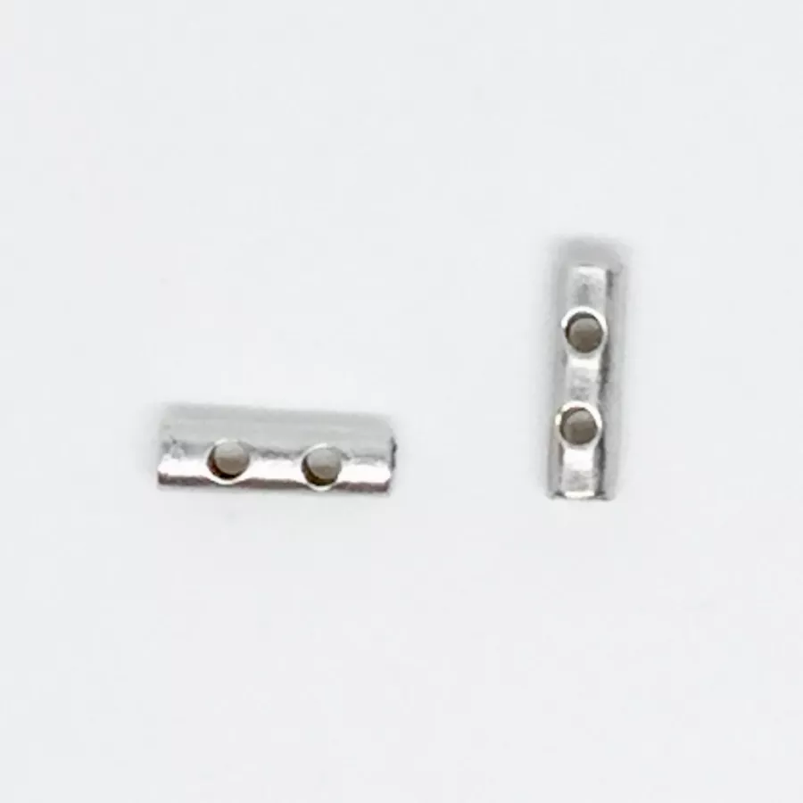 Intercalaire trous multiples 