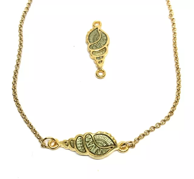 coquillage stylisé doré et émaillé