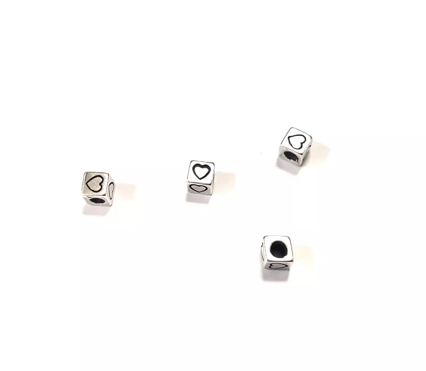 Intercalaire traversant cube avec motif coeur