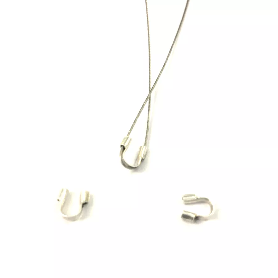 Cache-fils en laiton