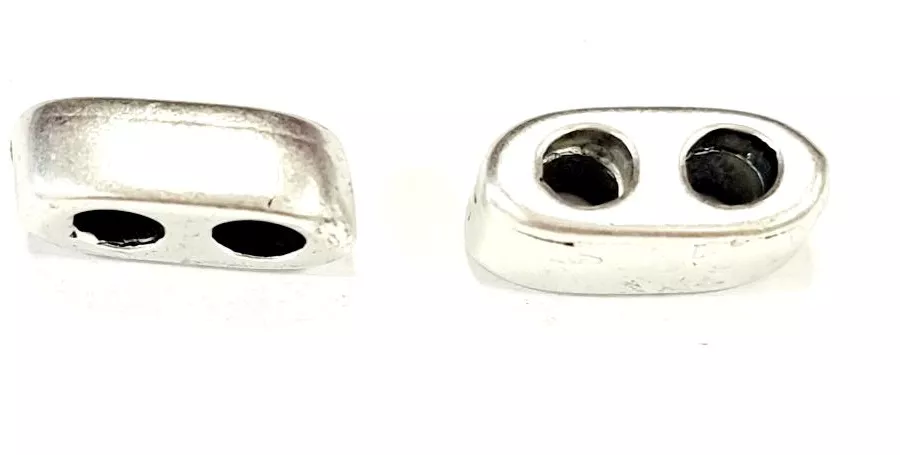 Intercalaire double trous